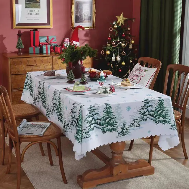 Mignonne nappe avec motifs de Noël sur la table - Deux variantes