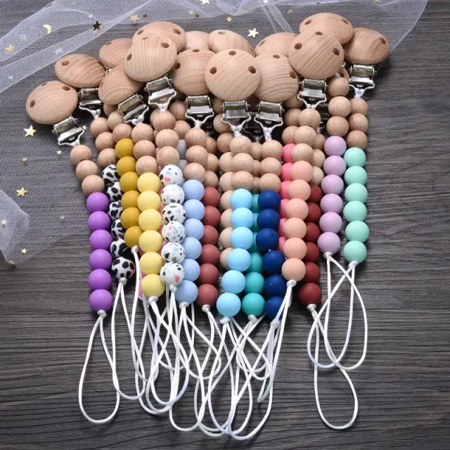 Wooden pacifier clip with silicone bite and round beads