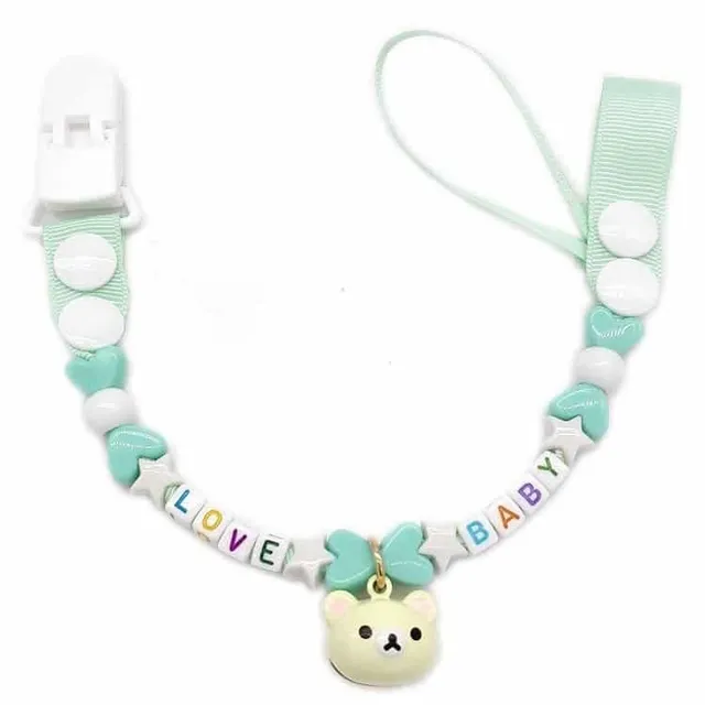 Toy with pacifier necklace © Babysitters