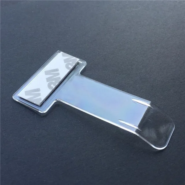 Adhesive clip for windshield