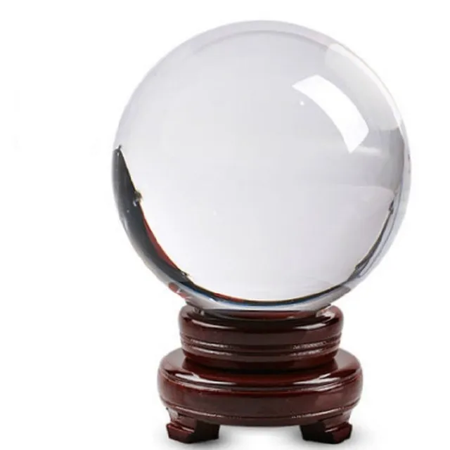 Crystal ball on wooden stand