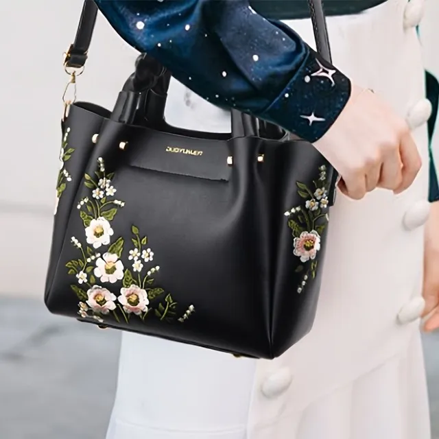 Elegant bag with floral embroidery and removable strap