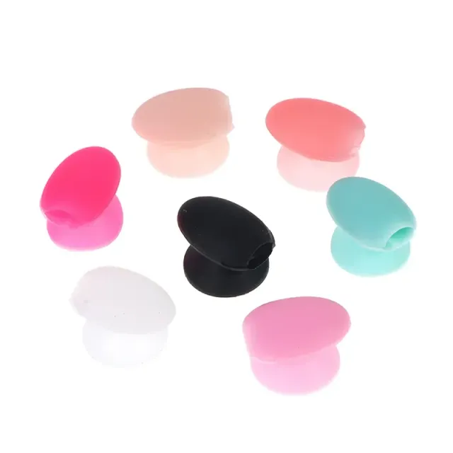 Practical silicone cover with suction cup for lip gloss applicators and eye shadows