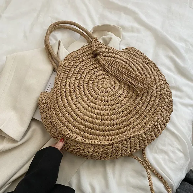 Summer round straw bag with holes in boho style for women