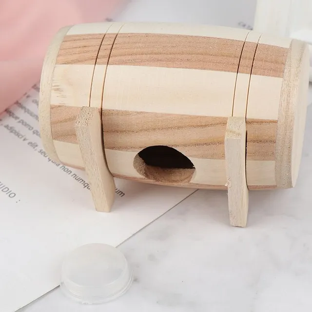 Practical wooden cash box in the shape of a barrel