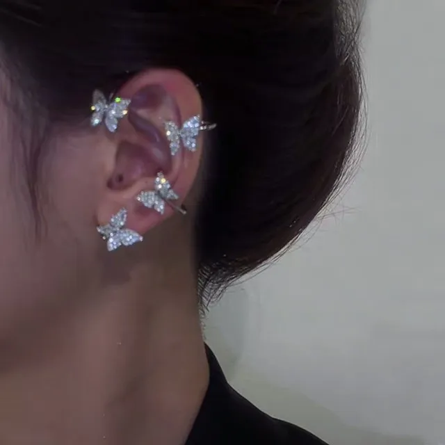 Fake earrings over the whole ear - glittering butterflies