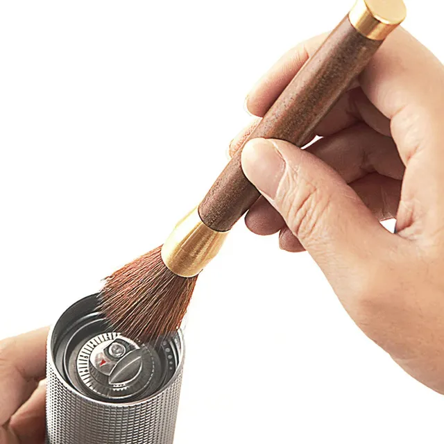 Brush for cleaning coffee from a grinder with wooden handle