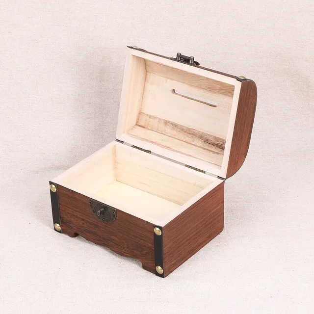 Wooden retro treasure box in the shape of a chest