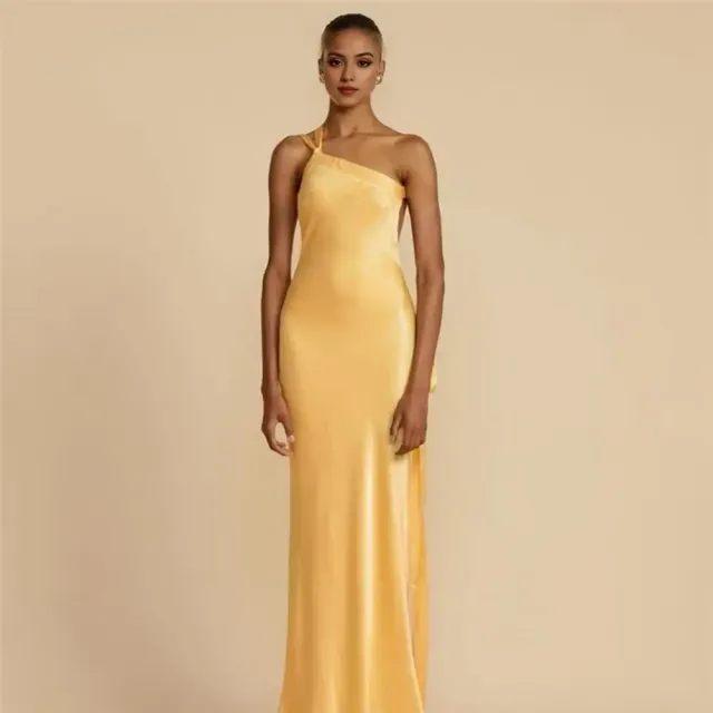 Women's elegant dress on one shoulder, long and in yellow color