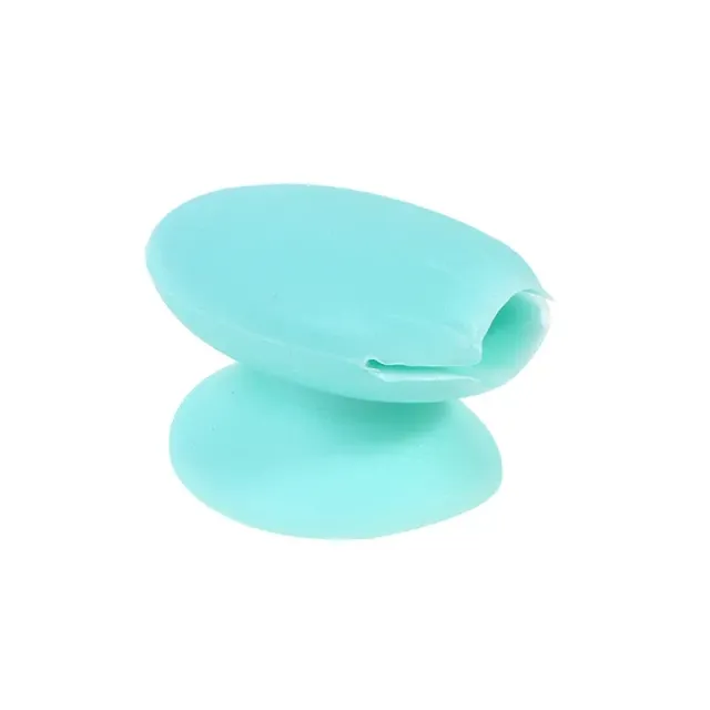 Practical silicone cover with suction cup for lip gloss applicators and eye shadows