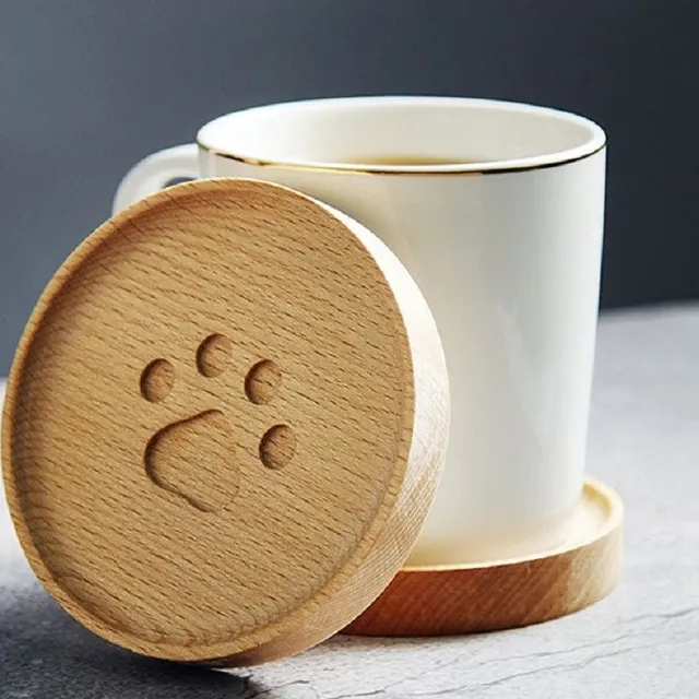 Wooden coaster with paw