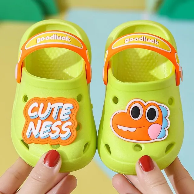 Children's perforated foam slippers with cute accessory