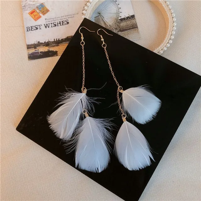 Boucles d'oreilles pendantes pour femmes avec plumes