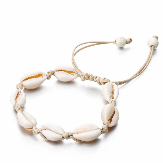 Bracelet made of shells on the leg white-anklet