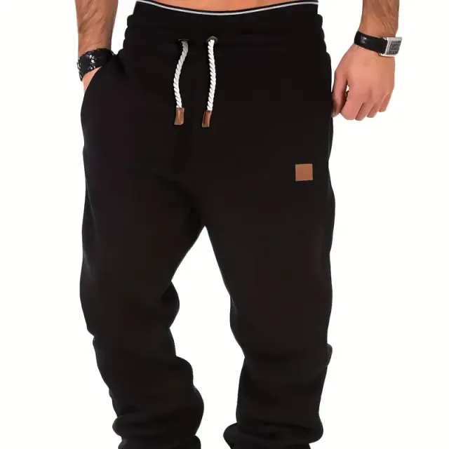 Classic men's narrowed tracksuits, free cut, slightly elastic waist, drawstring, autumn/winter, fitness and cycling