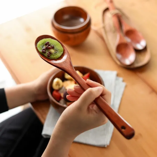 Wooden kitchen spoon with long handle