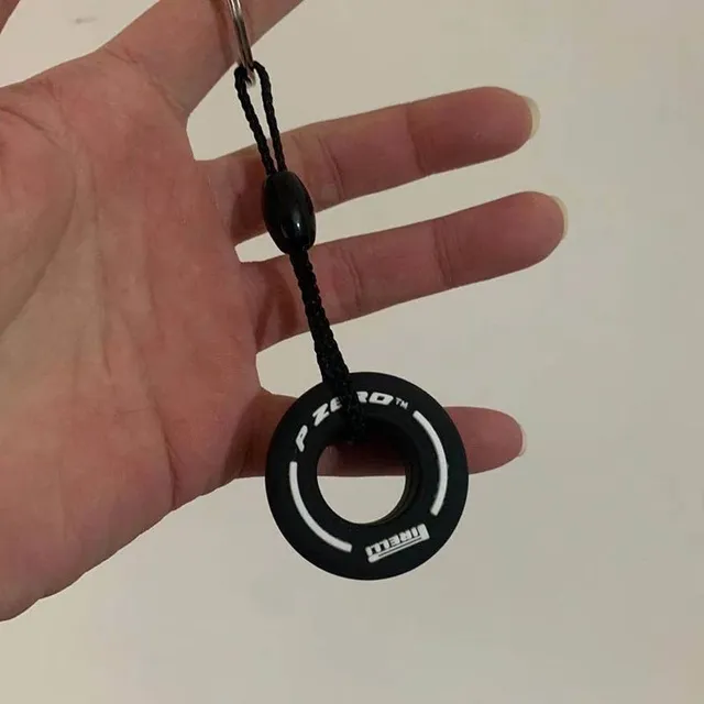 Pendant in the shape of a tyre