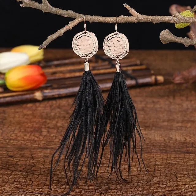 Women's dangle earrings with feathers