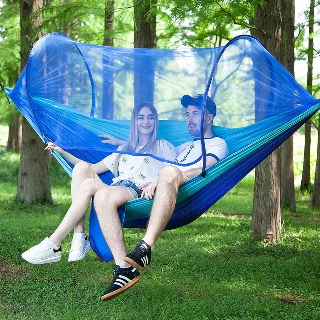 Outdoor hammock with automatic quick opening and mosquito net