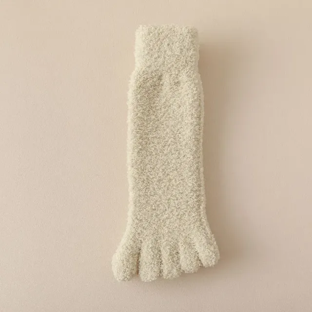 Women's winter socks made of coral fleece with separate fingers at home