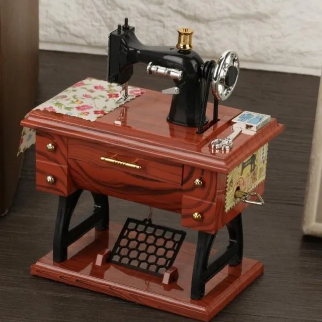 Music box in sewing machine style