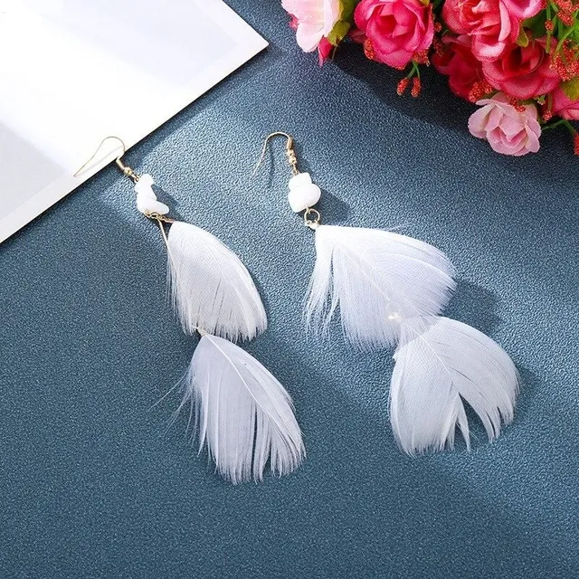 Women's dangle earrings with feathers