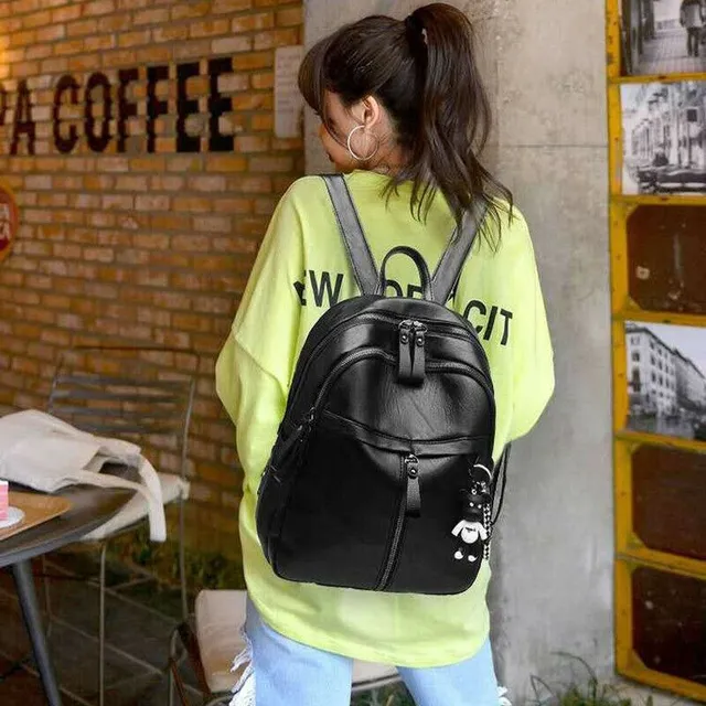 Ladies fashion backpack with decorative pendant