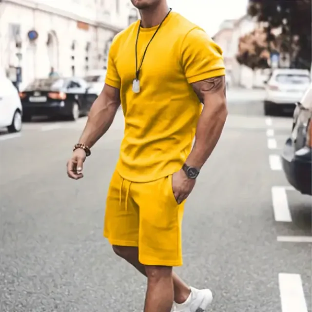 Male two-piece set made of smooth fabric, T-shirt with round neckline and shorts with string and pockets