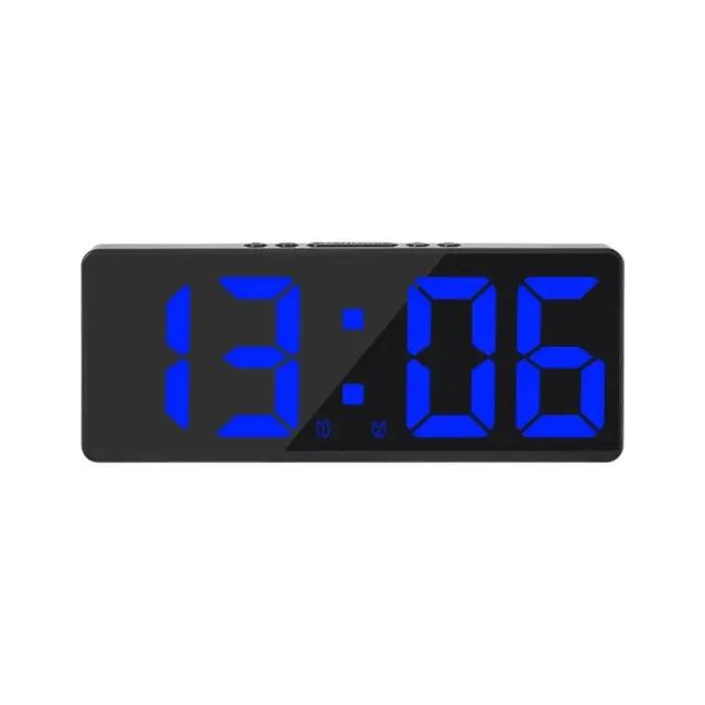 Digital alarm clock with LED display and temperature