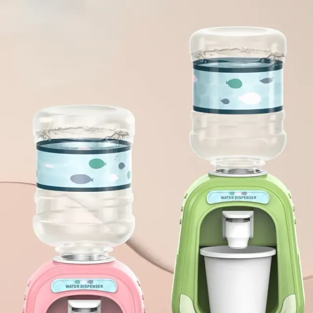 Mini water dispenser for children with cute motif for simulation of cold/hot water