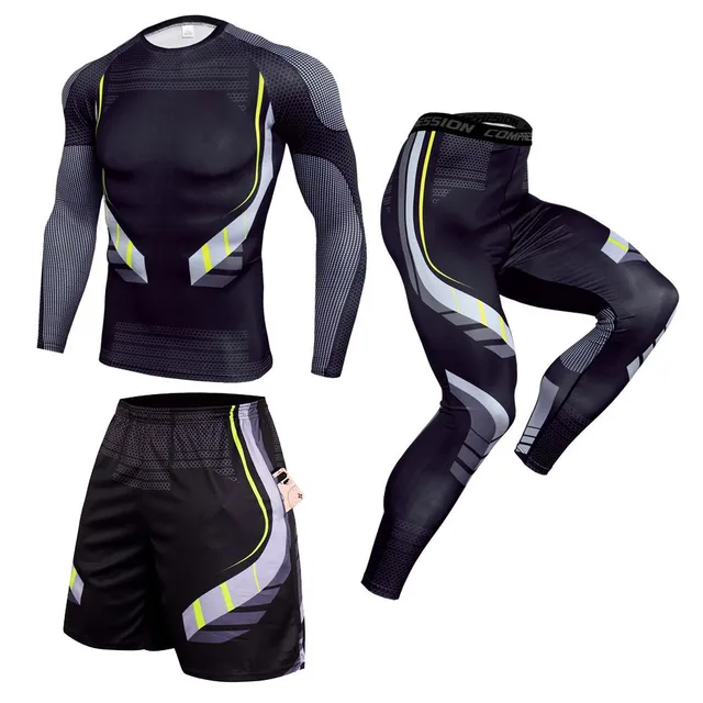 Men's modern set of sports compression clothing with shorts