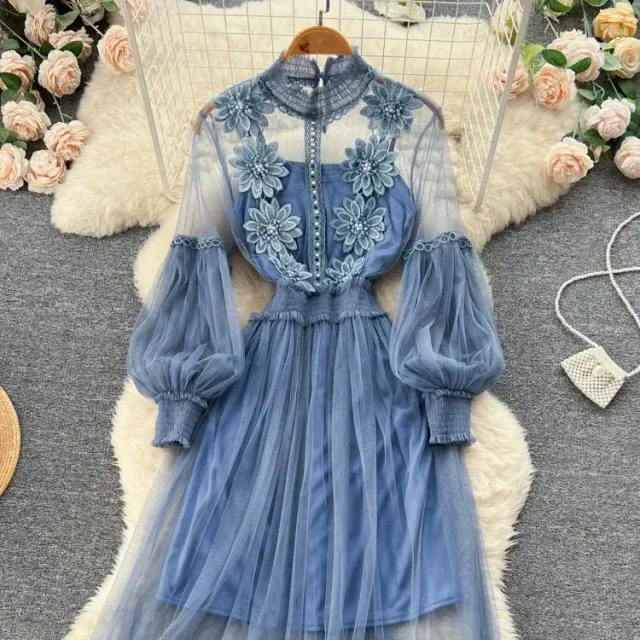 Fashion dress for women with meshed material, trim, fluffy sleeves, seed beads and distinctive 3D flowers