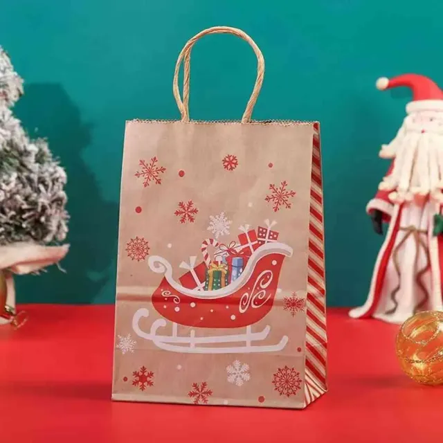 Pungi de hârtie de Crăciun cu motivul lui Moș Crăciun, renilor și clopoțeilor pentru copii