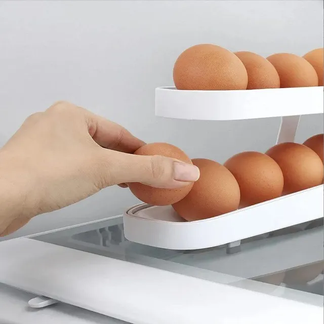 Automatic egg scrolling tray