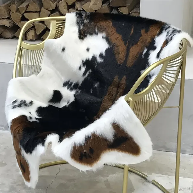 Faux cowhide floor fur