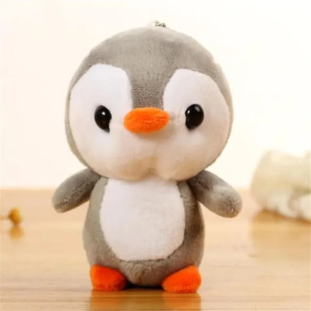 Malý plyšový barevný tučňák