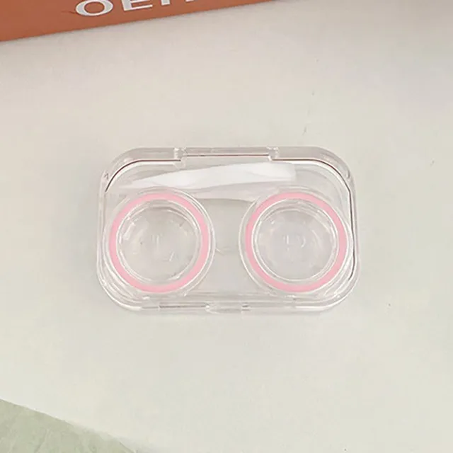 Miniature contact lens case made of clear plastic