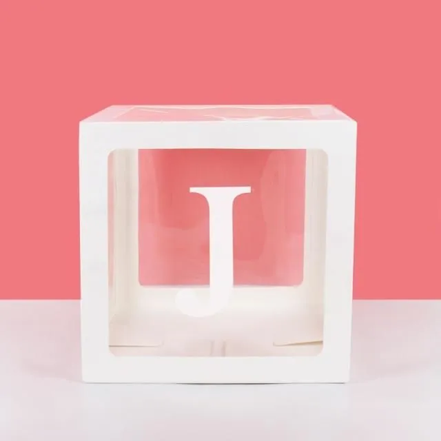 Transparentné kocky s písmenami