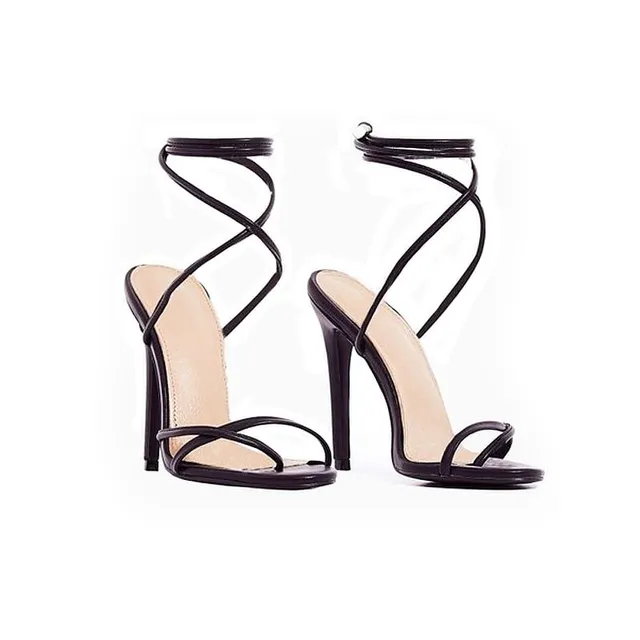 Original pumps with ankle straps on a high heel