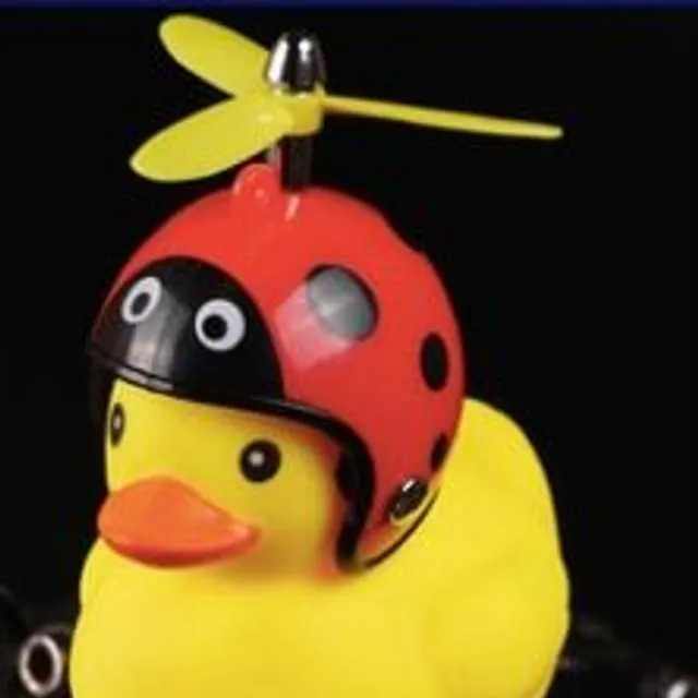 Cute bell for a child's wheel in the form of a duck beetle-propeller