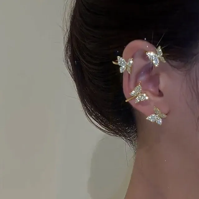 Fake earrings over the whole ear - glittering butterflies