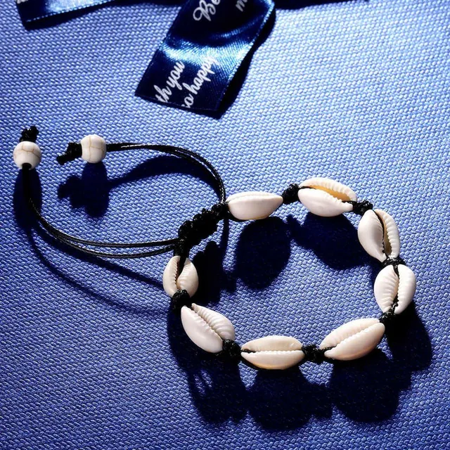 Bracelet made of shells on the leg