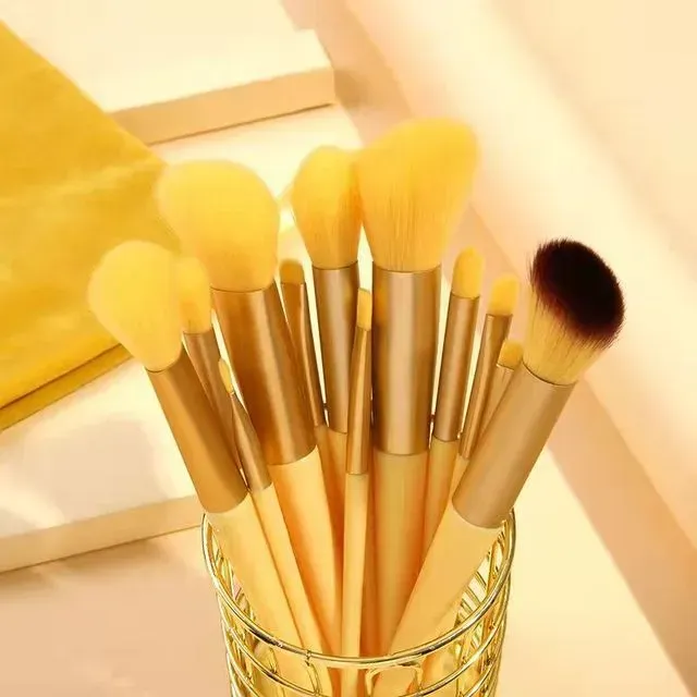 Set of fine and fluffy cosmetic brushes for applying make-up, powder, lipstick and shadows