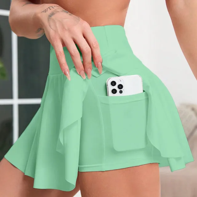 Tennis skirt with a wide ribbon in the waist and a volley line for active movement