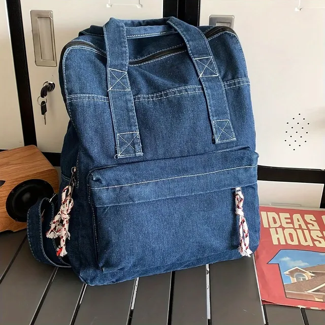 Vintage Denim Backpack - Light travel and school backpack in preppy style on laptop
