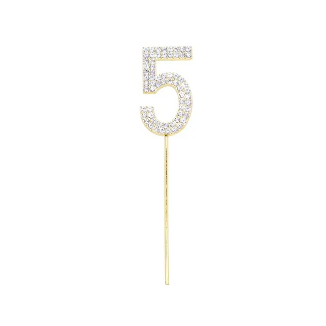 Decoration of cake with glittering zirconium - numbers