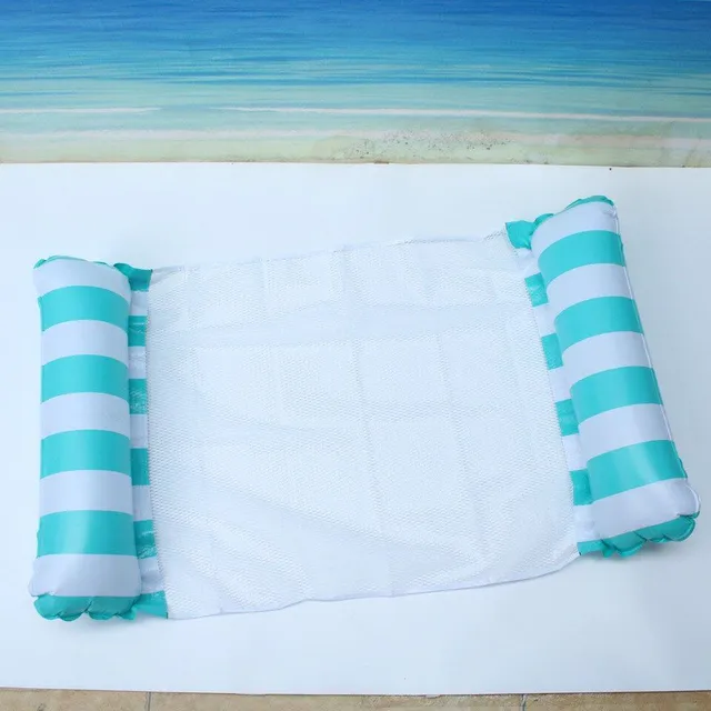 Foldable inflatable lounger for water