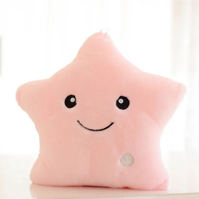 Beautiful plush glowing cushion in the shape of a star