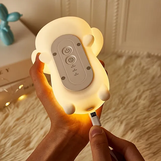 Pet night lamp, soft to the touch, lights up after taping