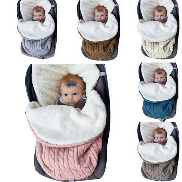 Children's knitted sleeping bag in various colours